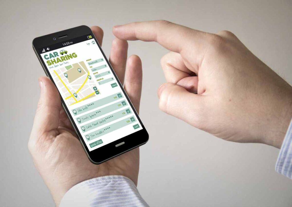 Mobilná aplikácia zdieľaného auta s upozornením na stiahnutú platbu.